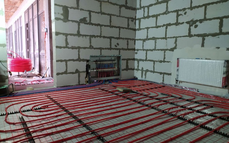 Монтаж комбинированного отопления теплым полом и радиаторамиотопления